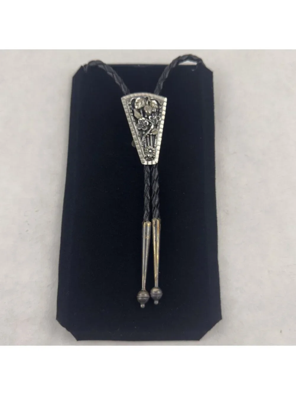 Vtg Black Hills Sterling Silver Bolo Tie Floral Silver Tips Braided Leather USA